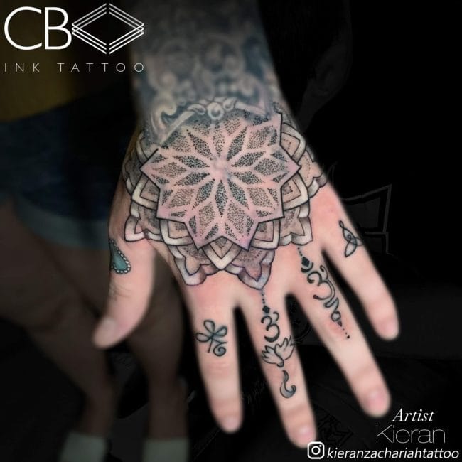 mandala hand tattoo