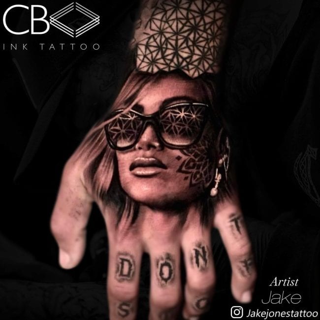 realism hand tattoo