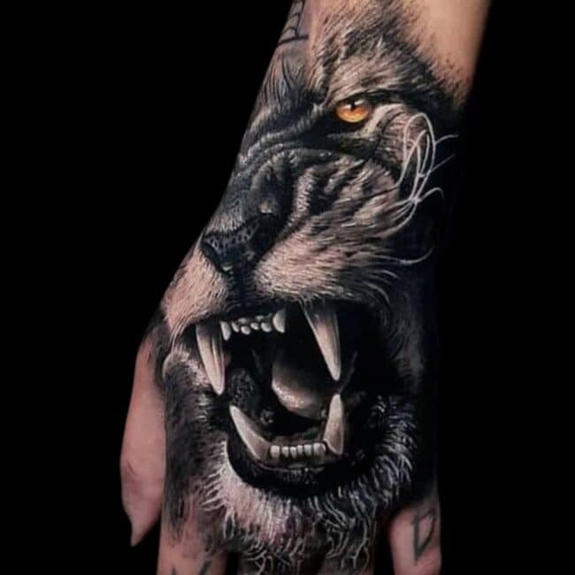 Lion Hand Tattoo