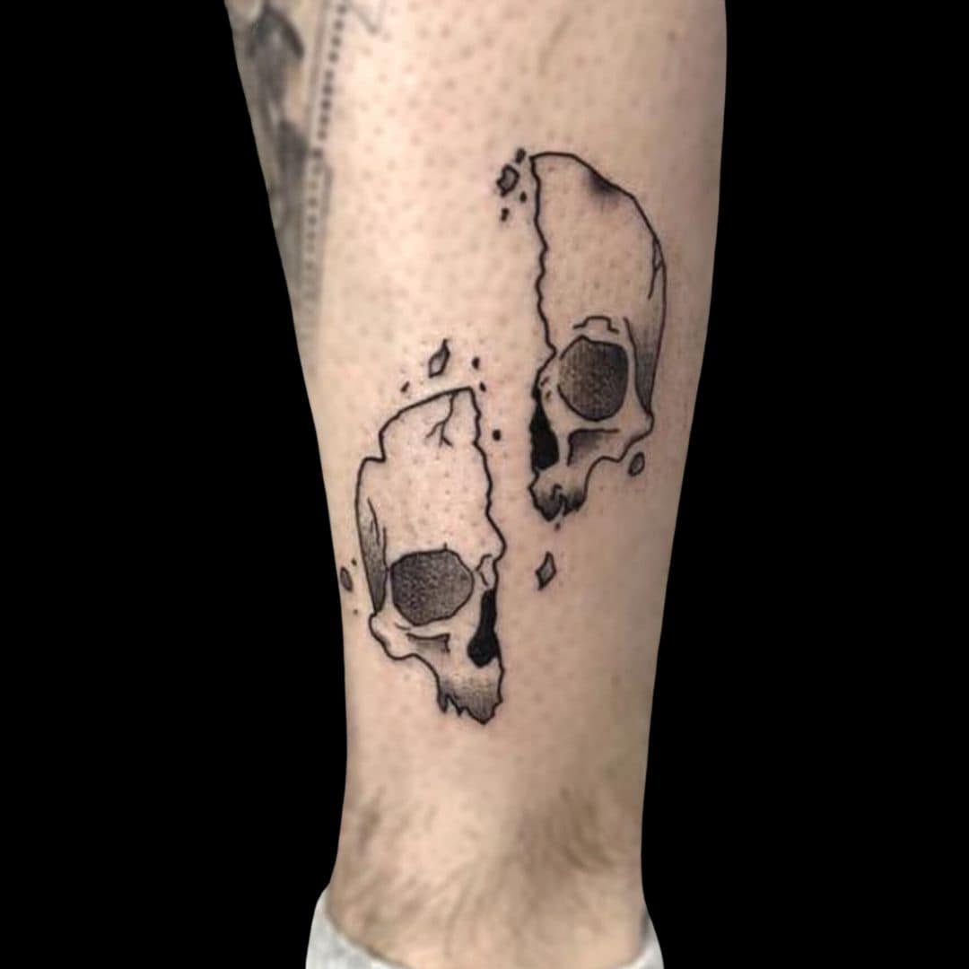 Ali Tattoo Artist Neo Traditional Blackwork Split Skull Leg Calf Tattoo
