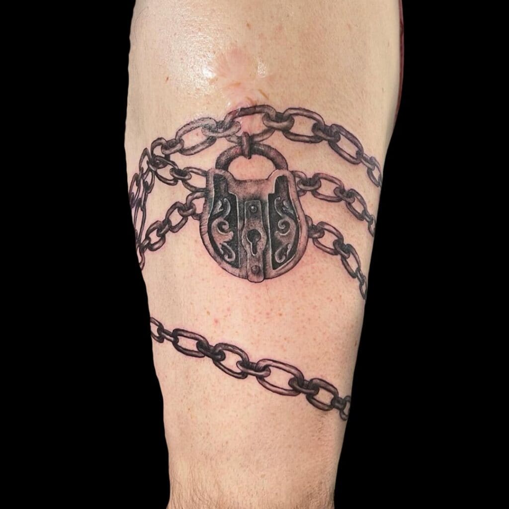 Beckett Tattoo Artist Realism Coverup Wrap Around Lock Chain Arm Tattoo