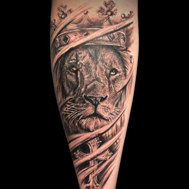 Corey Tattoo Artist Animal Realism Lion Cross Calf Leg Tattoo