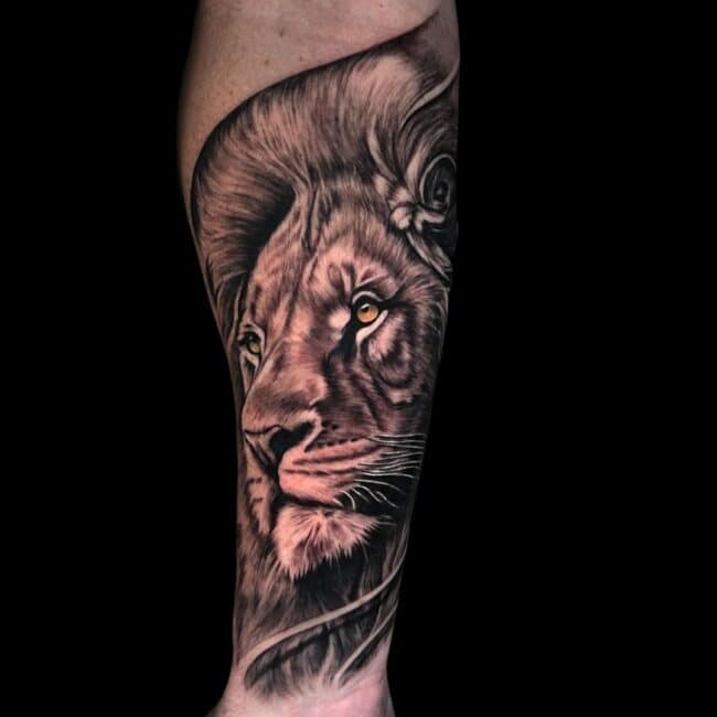 Erick Suarez Tattoo Artist Animal Black And Grey Realism Yellow Colour Eyes Lion Forearm Tattoo