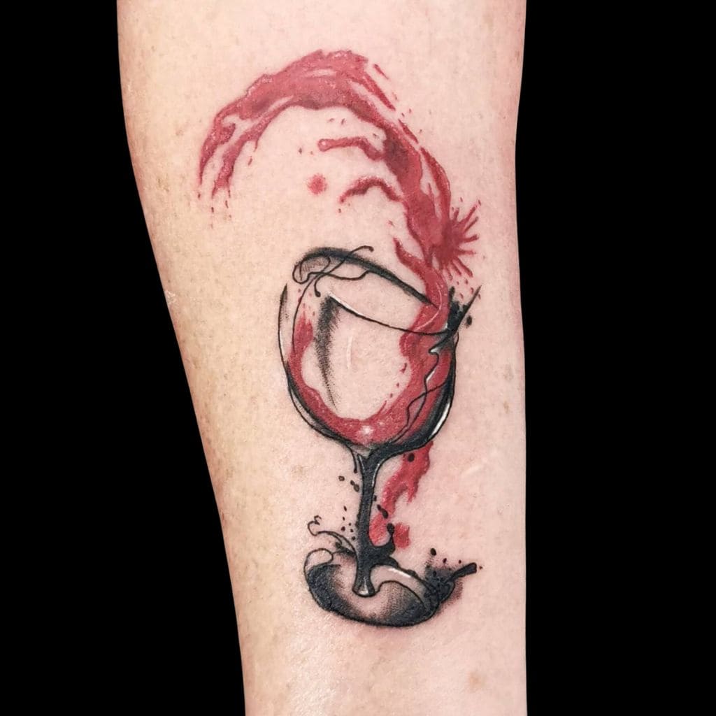 Raurie Tattoo Artist Trash Polka Watercolour Wine Glass Spilling Out Forearm Tattoo