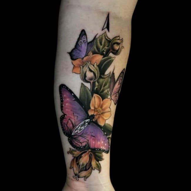Sunny Tattoo Artist Colour Realism Buttefly Flower Forearm Tattoo
