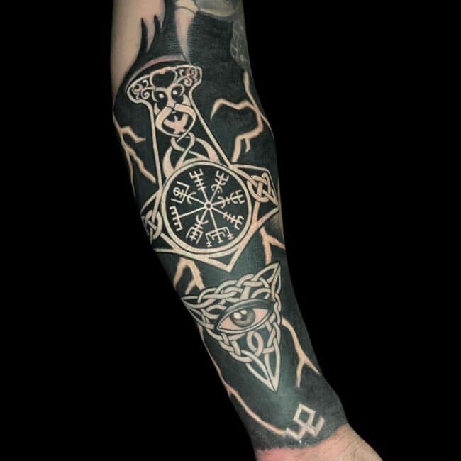 Thor Tattoo Artist Nordic Mjollnir Eye of Odin Symbolism Forearm Sleeve Tattoo