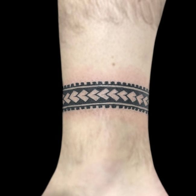 Corey Tattoo Artist Tribal Ankle Wrap Around Tattoo
