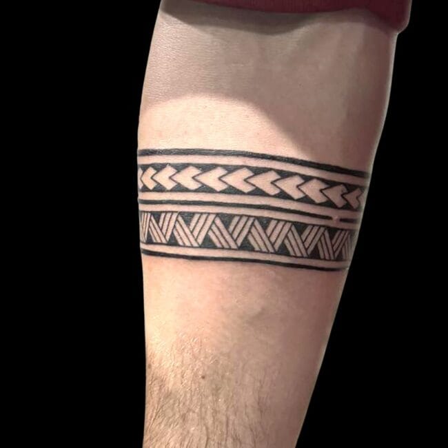 Isabella Tattoo Artist Tribal Wrap Around Forearm Tattoo