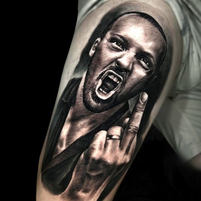 Jake Jones Tattoo Artist Angry Blackman The Finger Shoulder Arm Tattoo