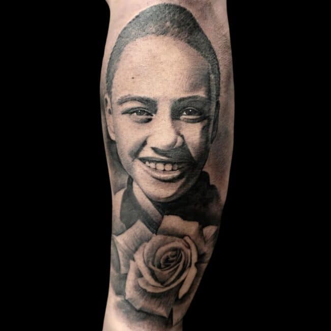 Jake Jones Tattoo Artist Realism Portrait Black Boy Rose Forearm Tattoo