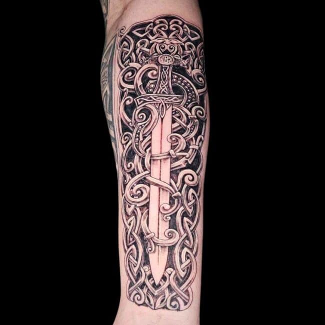 Raurie Tattoo Artist Mythology Tribal Mandala Geometric Sword Forearm Tattoo