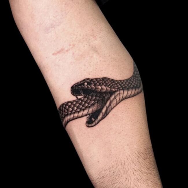 Snake Eating Itself Tattoo