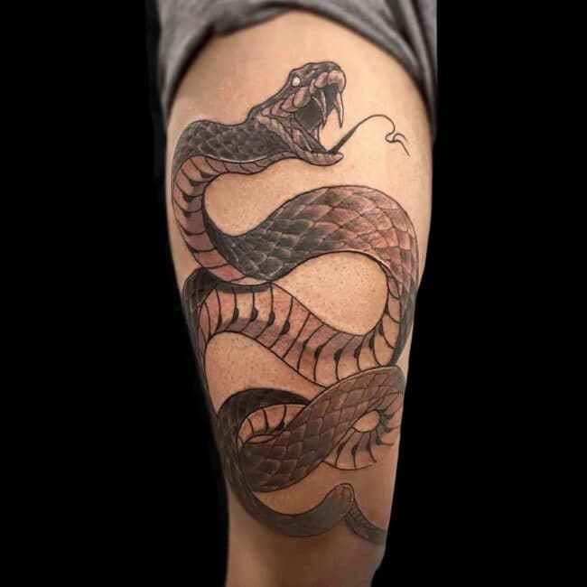 Snake Thigh Tattoo