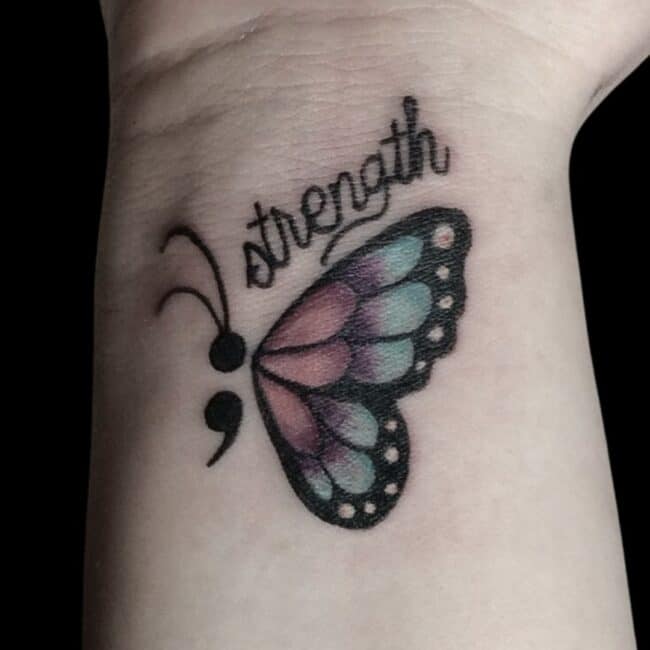 strength butterfly tattoo wrist