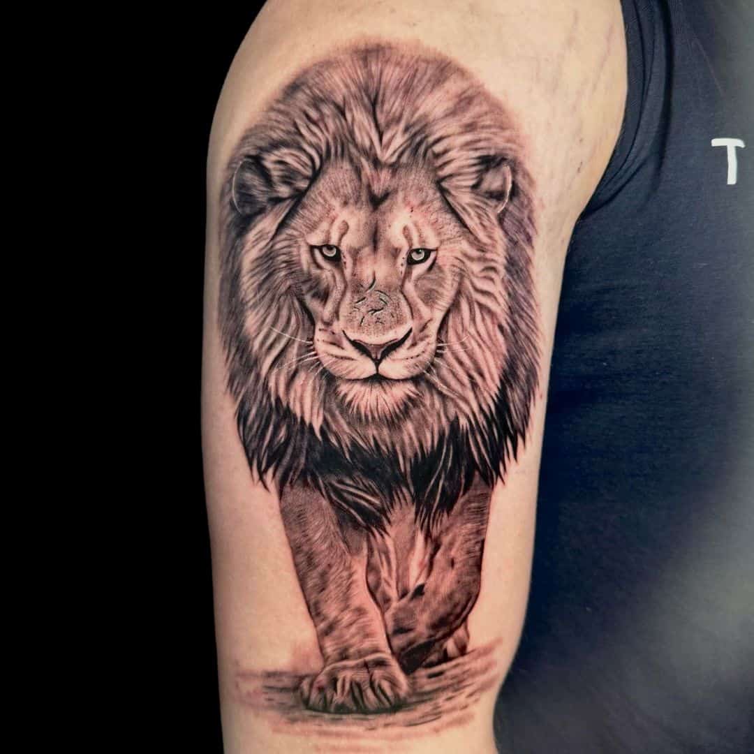 Josh Tattoo Artist Realism Black And Grey Walking Lion Arm Tattoo
