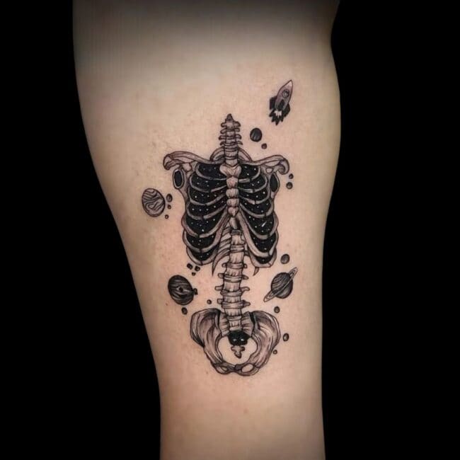 Pukaz Tattoo Artist Fine Line Black And Grey Floating Skeleton Space Rocket Forearm Tattoo