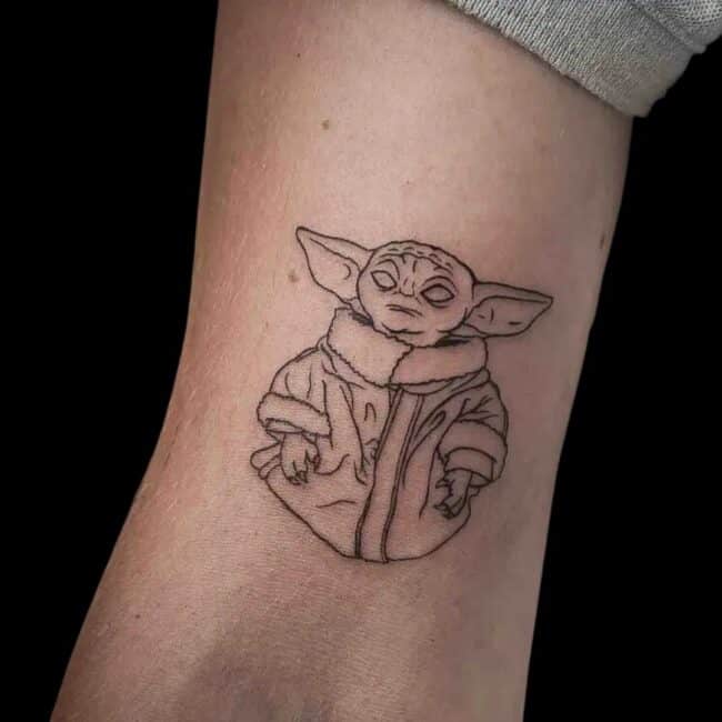 Raurie Tattoo Artist Fine Line Anime Cartoon Star Wars Yoda Arm Tattoo