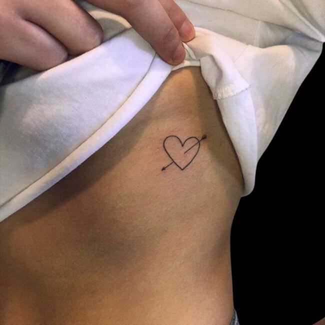 Arrow and heart tattoo