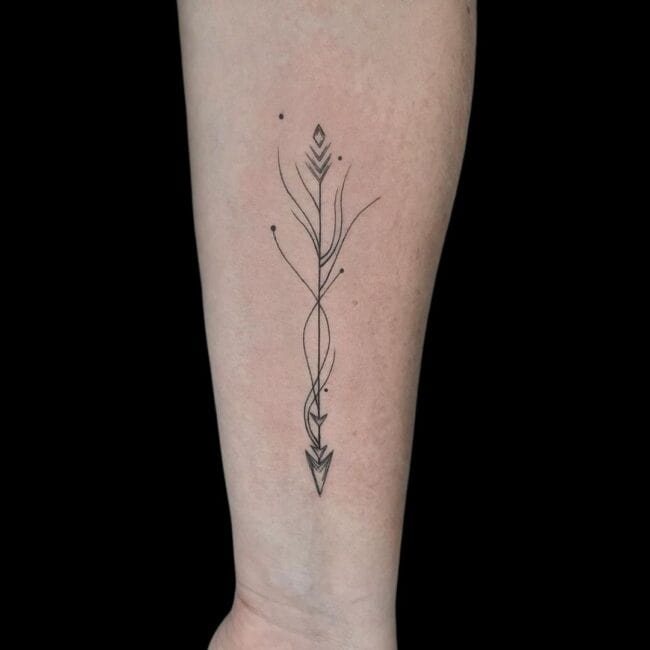 Elegant Female Arrow Tattoo