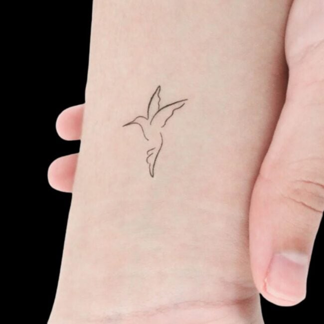 Minimalist Hummingbird Tattoo