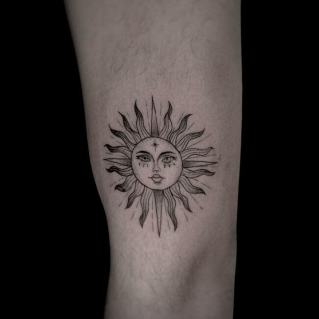 Simon Tattoo Artist Sun Face Arm Tattoo