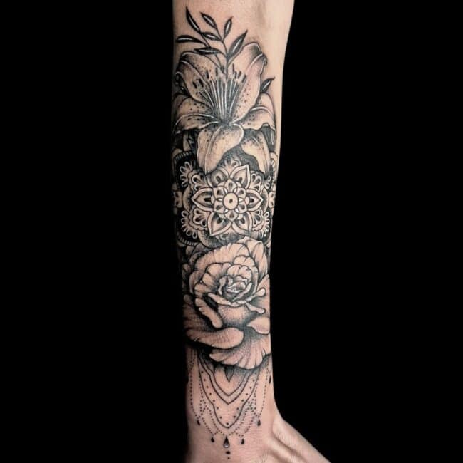 Elizabeth Tattoo Artist Realism Mandala Behind Two Flowers Arm Tattoo