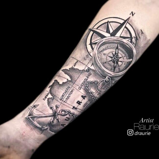 Raurie Tattoo Artist Ancient Compass and Map Black and White Realism Arm Tattoo