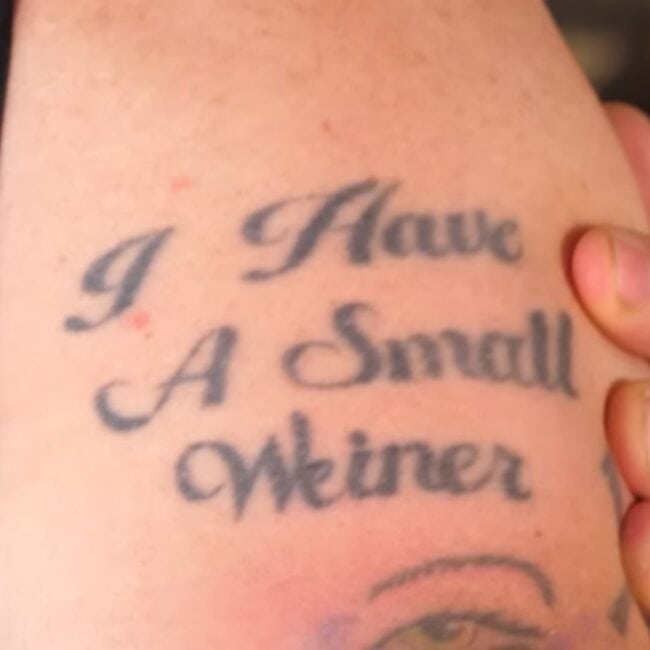 Steve-O Black and White Writing Shoulder Tattoo