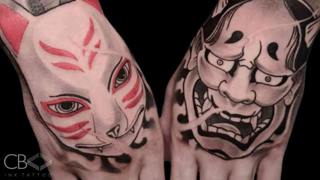 Both Hands Tattooed with Japenese Style Tattoos Samurai Mask Cat Mask Blog Cover Image