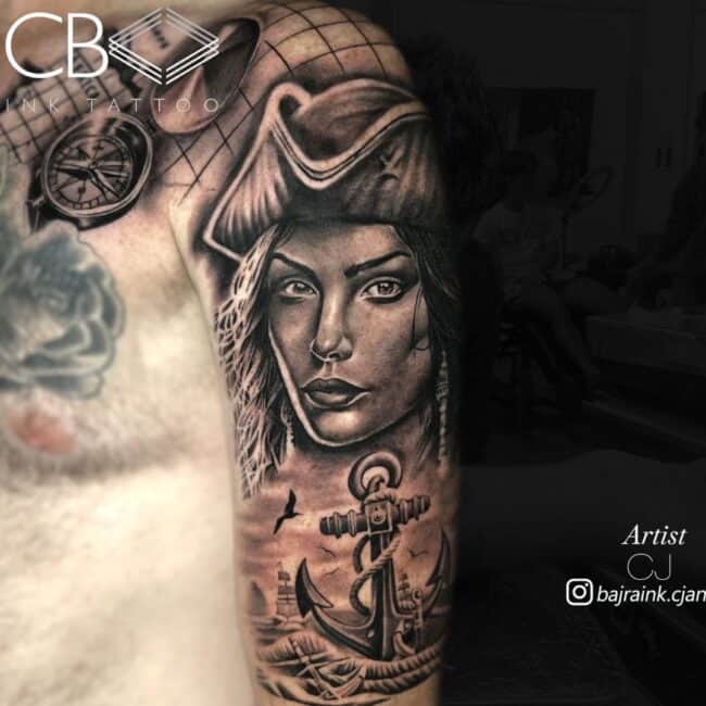 CJ Tattoo Artist Portrait Black and Grey Woman Pirate Scar Pirate Hat On Anchor On Sea Seagull in the Background Sleeve Arm Tattoo