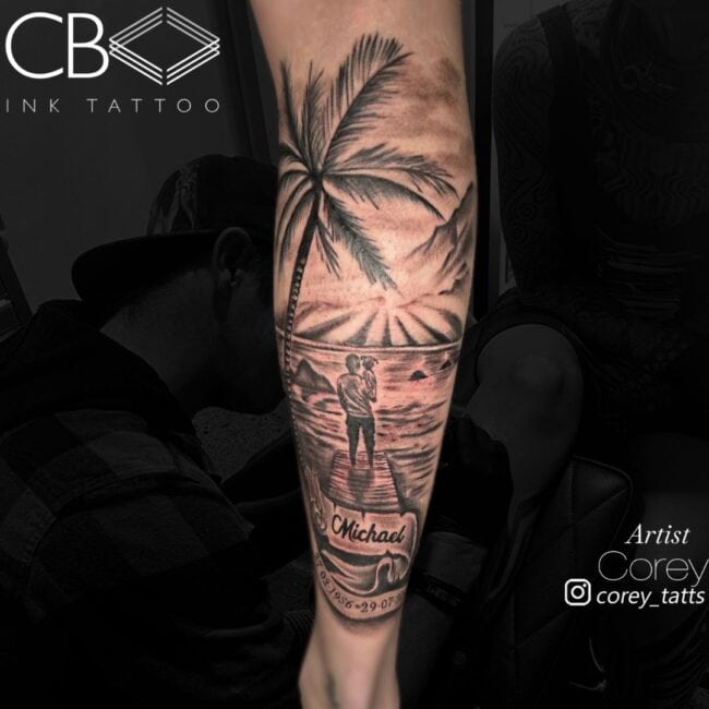 Corey Tattoo Artist Black and Grey Realism Blackwork Memorial Beach Scene with Father & Daughter Palms Sea View Pier Mountain Michael Writing with Dates Calf Tattoo