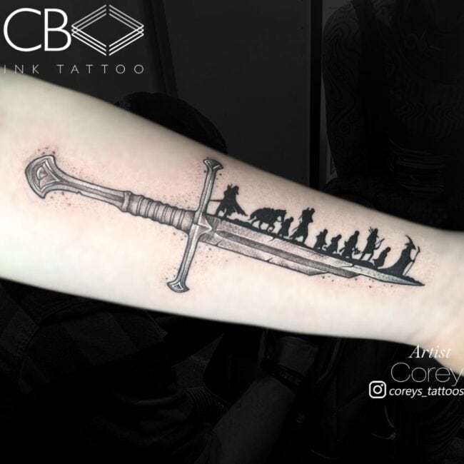 Corey Tattoo Artist Fine Line Realism The Fellowship of The Ring Walking on The Edge of Narsil Sword The Lord of The Rings Forearm Tattoo