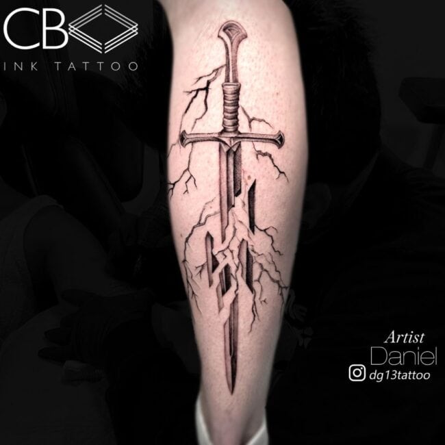 Daniel Tattoo Artist Realism Black and Grey Narsil Sword Broken In Pieces With Lightning in the Background The Lord of the Rings Lat Tattoo