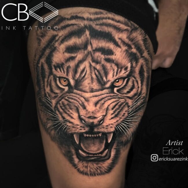 Erick Tattoo Artist Realism Black and Grey Colour Tiger Eyes Tiger Head Sharp Teeth Hissing Thigh Leg Tattoo