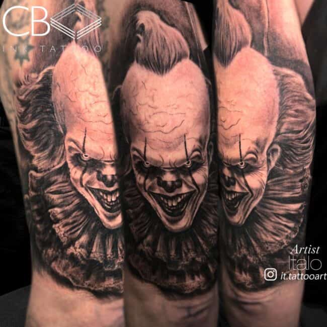 Italo Tattoo Artist Realism Black and Grey It Pennywise The Clown Smiling Diabolical Expression Portrait Arm Tattoo