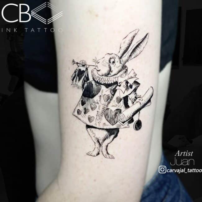 Juan Tattoo Artist Fine Line Alice in the Wonderland The Court Rabbit Blowing the Trumpet Arm Tattoo