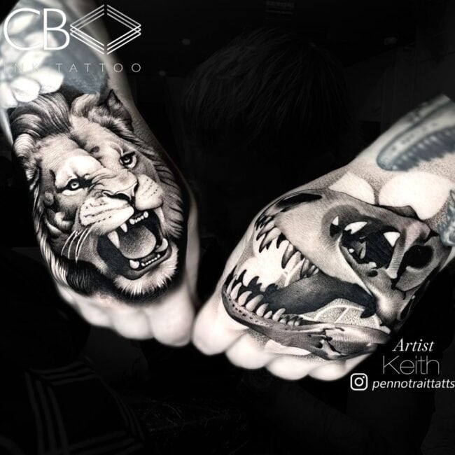 Keith Tattoo Artist Realism Black and Grey Roaring Lion Detailed Features on on Right Palm T-Rex Skull Sharp Teeth Detailed on Left Palm Tattoos