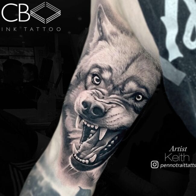 Keith Tattoo Artist Realism Black and Grey Wolf Growling Head Sharp Teeth Detailed Shadowing Detailed Lines Arm Tattoo