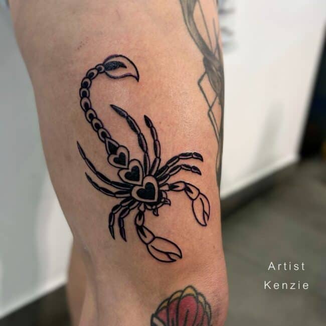 Kenzie Tattoo Artist Traditional Full Body Scorpio Three Hearts on Abdomen Eight Legs Detailed Thigh Leg Tattoo