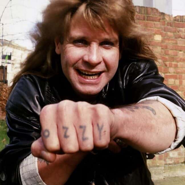 Ozzy Osbourne and His DIY Knuckle Tattoos, Ozzy Osbourne Showing Off His Ozzy Finger Tattoos, Photo