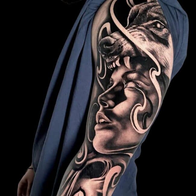 Penno Tattoo Artist Chicano Black and Grey Woman Wearing a Wolf Cowl Full Sleeve Arm Tattoo