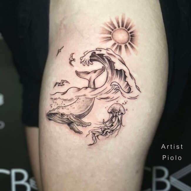 Piolo Tattoo Artist Fine Line Black and Grey Sea Ocen Wave Whale Caudal Fin Above The Sea Surface Medusa Seagull Sun Thigh Leg Tattoo