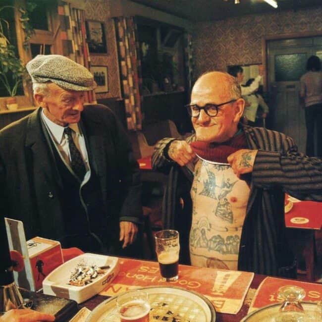 Pub Patron in Boston, Lincolnshire, England, 1974, Man Showing Off His Tattoos in a Pub Photo