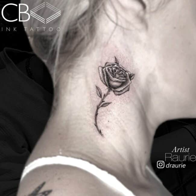 Raurie Tattoo Artist Realism Black and Grey Rose Flower Thorns Stem Leaves Shadowing Neck Tattoo
