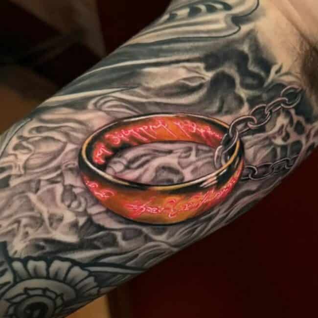Sheela Tattoo Artist Realism Colour One Ring with Elvish Inscription Silhouettes of The Fellowship Of The Ring The Lord of The Rings Sleeve Arm Tattoo