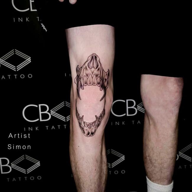 Simon Tattoo Artist Fine Line Black and Grey Skull Jaw Detailed Vampire Teeth Knee Tattoo
