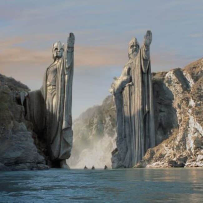 The Argonath Statues over Anduin River Three Boats Image From The Lord of The Rings Movie