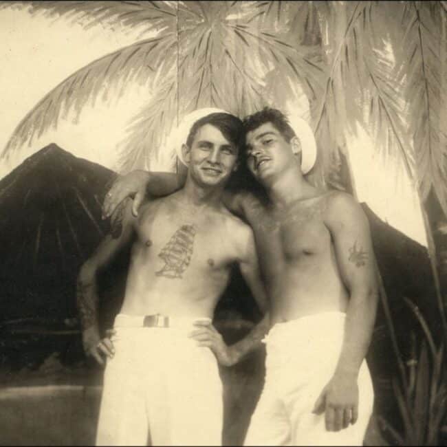 Two Shirtless Sailors in Hawaii, 1943, Tattoo on Sternum and Arm Tattoo Palm and Volcano in The Background Black and White Photo