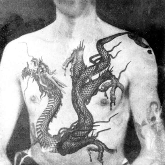 Victorian Man Showing Off His Chinese Dragon Chest Tattoo, Black And White Photo