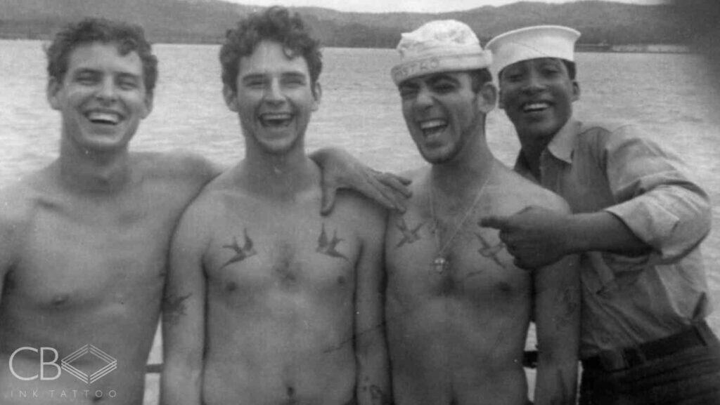 Vintage Military Ink The Tattoos of WWII Soldiers Black and White Old Photo Four Soldiers with Tattoos Smiling Blog Cover Image